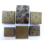 Six various brass square coin weights impressed 10s 6d, 5 P:WT etc with coffee pot, star and crown