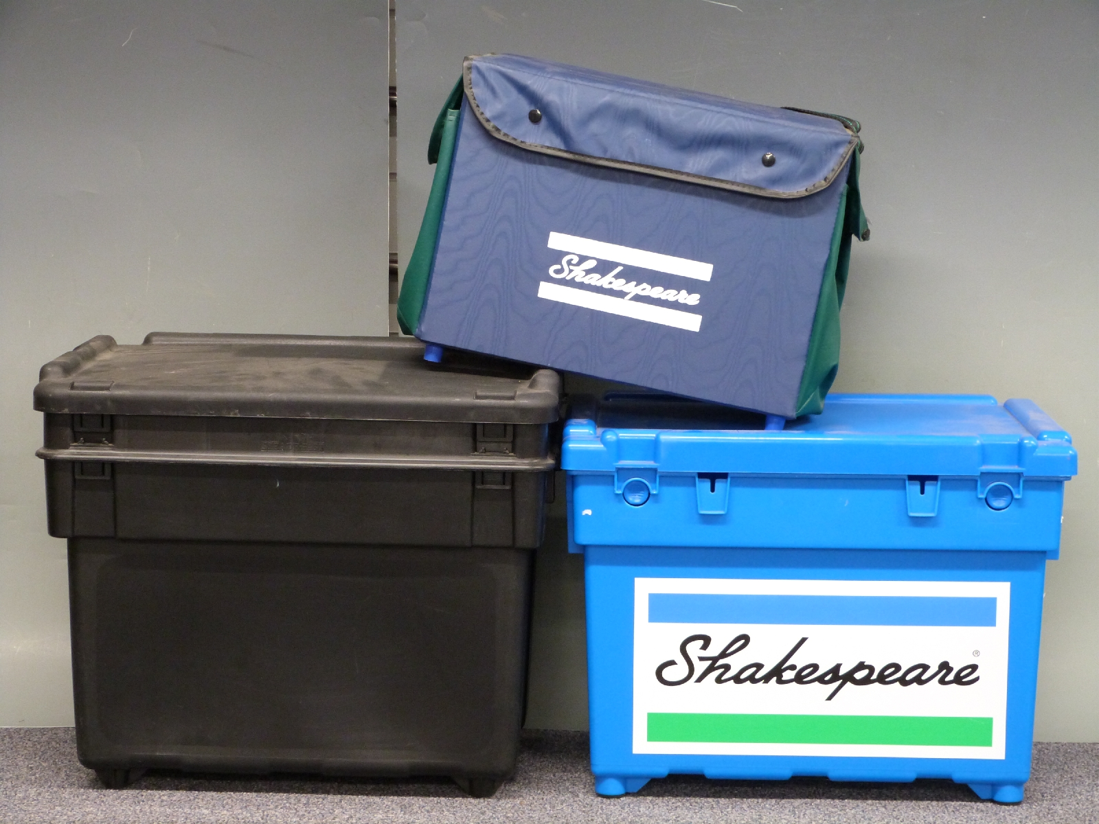 Two Shakespeare seat boxes together with a Steade-fast example