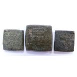 Three James I square bronze coin weights for gold unite, angel and eleven shillings (half unite),