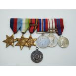Royal Navy WWII medals comprising 1939-1945 Star, Atlantic Star, Burma Star with Pacific clasp,