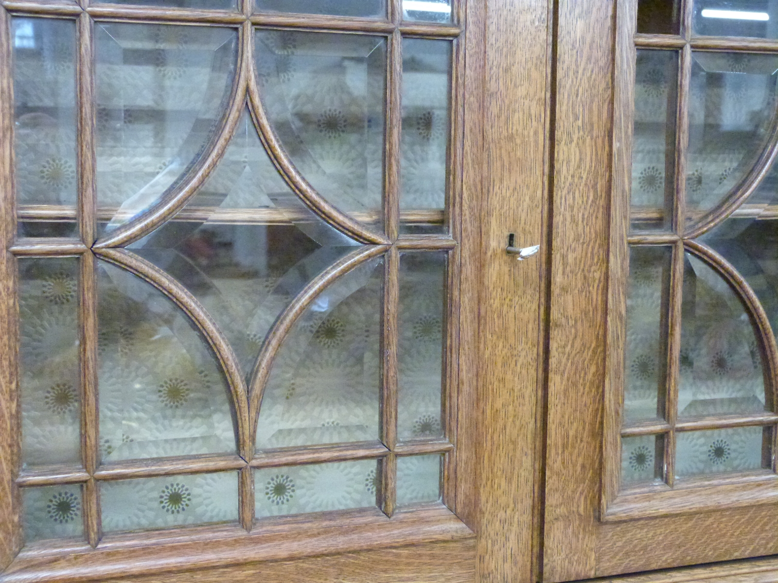 Art Nouveau oak sideboard with bevelled astragal glazed cabinet to top, the base fitted three - Image 4 of 7