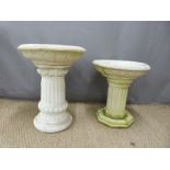 Two small bird baths raised on reeded columns, height of taller 53cm