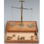 18thC/early 19thC probably French bullion scales, the drawer housing a run of cup weights and