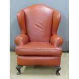 Leather style upholstered wing back chair