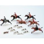 Britains lead model hunting set compromising six huntsmen and women and horses, eight hounds and a