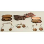 Three cased sets of travelling beam scales, one including George III coin weights