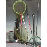 Seven various landing nets with handles including Sigma, Abu, extendable 3m examples etc