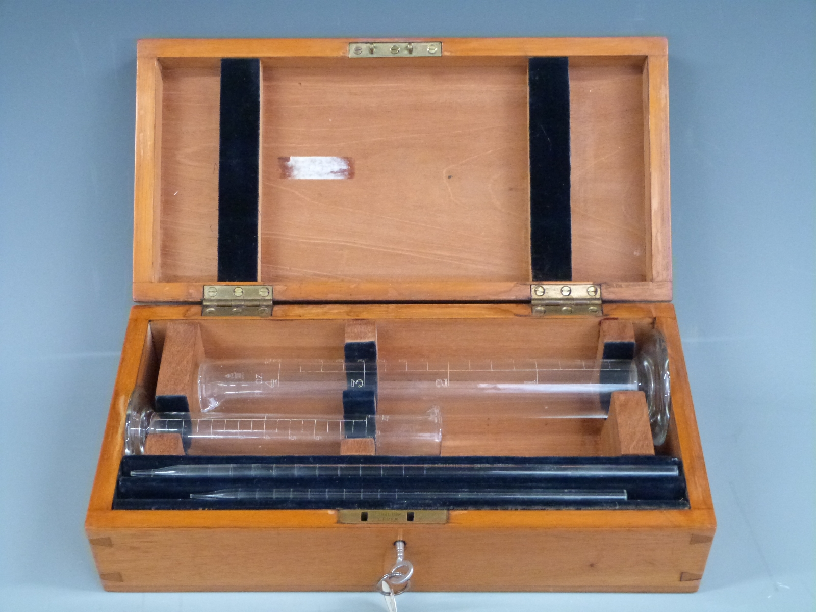 Cased set of George V Cheshire County Council glass standard measures, each numbered 4528 and with