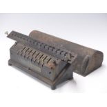 TIM mechanical calculator sold by Time-into Co Chicago with original metal cover