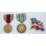 United States of America medals comprising a Good Conduct Medal and Outstanding Volunteer Service