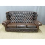 Brown leather Chesterfield sofa, length 184cm