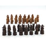 Chinese figural chess set, each piece approximately 10cm tall, in original box