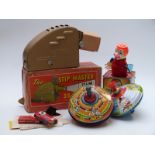 Chad Valley Humming Spinning top together with one similar, a Mattel Jack In the Music Box and The