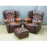 Pair of oxblood leather Chesterfield armchairs and footstool