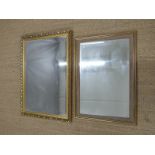 Two gilt mirrors with bevelled glass, larger 102 x 71 overall