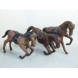 Three leather covered horses in the style of Liberty, length 35cm