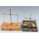 Two sets of travelling beam scales, one in drawer type case, W26cm