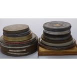 Ninteen 16mm cine film reels including examples marked 'Salute to the Soviet', 'The Ice Witch', '