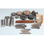 A quantity of various cast iron weights and punch blanks, largest weight 4lb, ex Monmouthshire