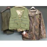 A selection of shooting and fishing clothing to include Showbee Rockee jacket, overtrousers etc,