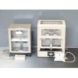 Two cased sets of laboratory beam scales, one marked to beam County Borough of Newport and with