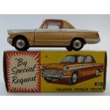 Corgi Toys dicast model Triumph Herald Coupe with bronze and white body and red interior 231, in