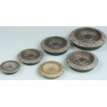 A run of A K & Sons flat stacking weights 4lb to 2oz with cast iron decorative borders, and two