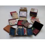 Twenty-four vintage double decks of playing cards including some advertising related, all in