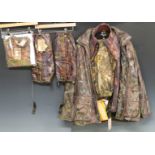 Two Jack Pyke shooting and fishing jackets together with two pairs of trousers by Mad Dog Company,