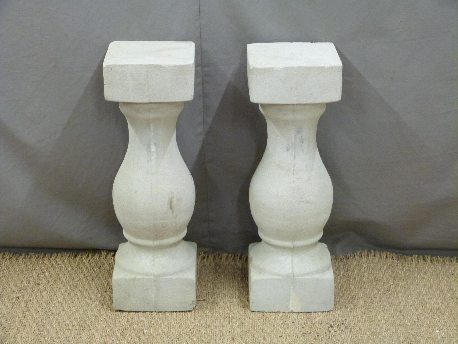 Sixteen reconstructed stone columns, height 61cm