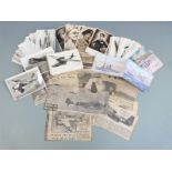 A collection of WWII interest postcards including naval ships, aircraft, people etc