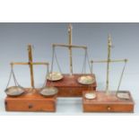 Three sets of travelling beam scales, one W A Webb Ltd, York, another Avery, height of tallest 40cm