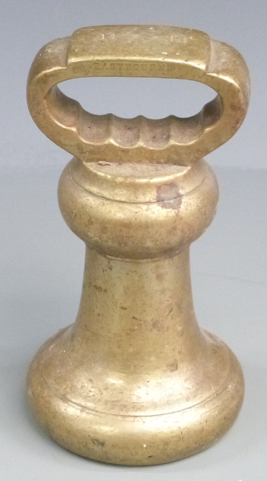 Victorian 14lb brass bell weight with Easton impressed to base and Eastbourne to one side of handle