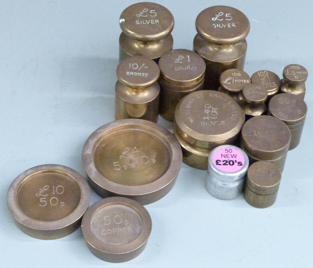 A quantity of coin, note and other banking weights including Westminster Bank Limited £5 silver, run