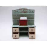 Tri-ang Stores miniature wooden shop display dresser with four drawers to base, 38 x 30.5cm
