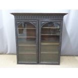 Victorian carved oak glazed bookcase with adjustable shelving, W153 x D45 x H155cm