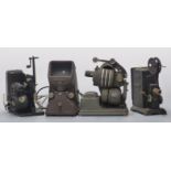 Four vintage cine projectors including Kodascope model C 16mm example, hand-cranked example and a