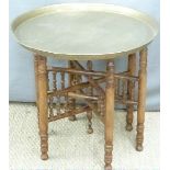 Brass topped folding Eastern style table, diameter 58cm