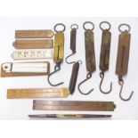 A collection of folding rulers including W M Marples & Sons and Rabone Chesterman, together with