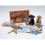 Two Sindy dolls together with a collection of clothes and accessories including Furnishing Pack in