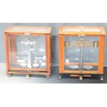 Two cased sets of laboratory scales, both marked L.Oertling London EC, width of each approximately