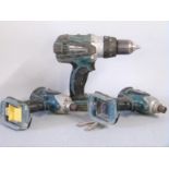 Three Makita drills/drivers