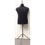 A vintage tailor's dummy raised on a black metal stand, height 161cm