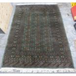Small rug with green ground