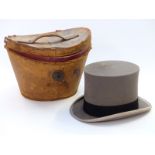 Lock and Co top hat in vintage leather case