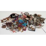 A collection of costume jewellery including belts, necklaces, two Victorian lockets etc