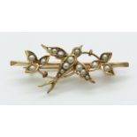 A 9ct gold brooch set with seed pearls in the form of a swallow, 3.6g, 4cm