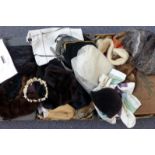A collection of fur wraps and vintage handbags, makes include Gheradini