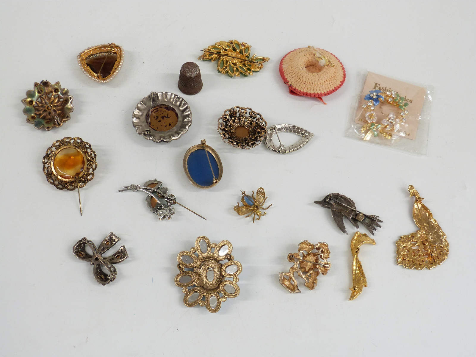 A collection of costume jewellery including beads, brooches, watches, silver handled button hook, - Image 6 of 7