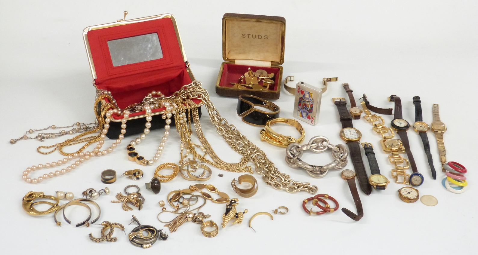 A collection of costume jewellery including bracelets, necklaces, watches, cufflinks, white metal